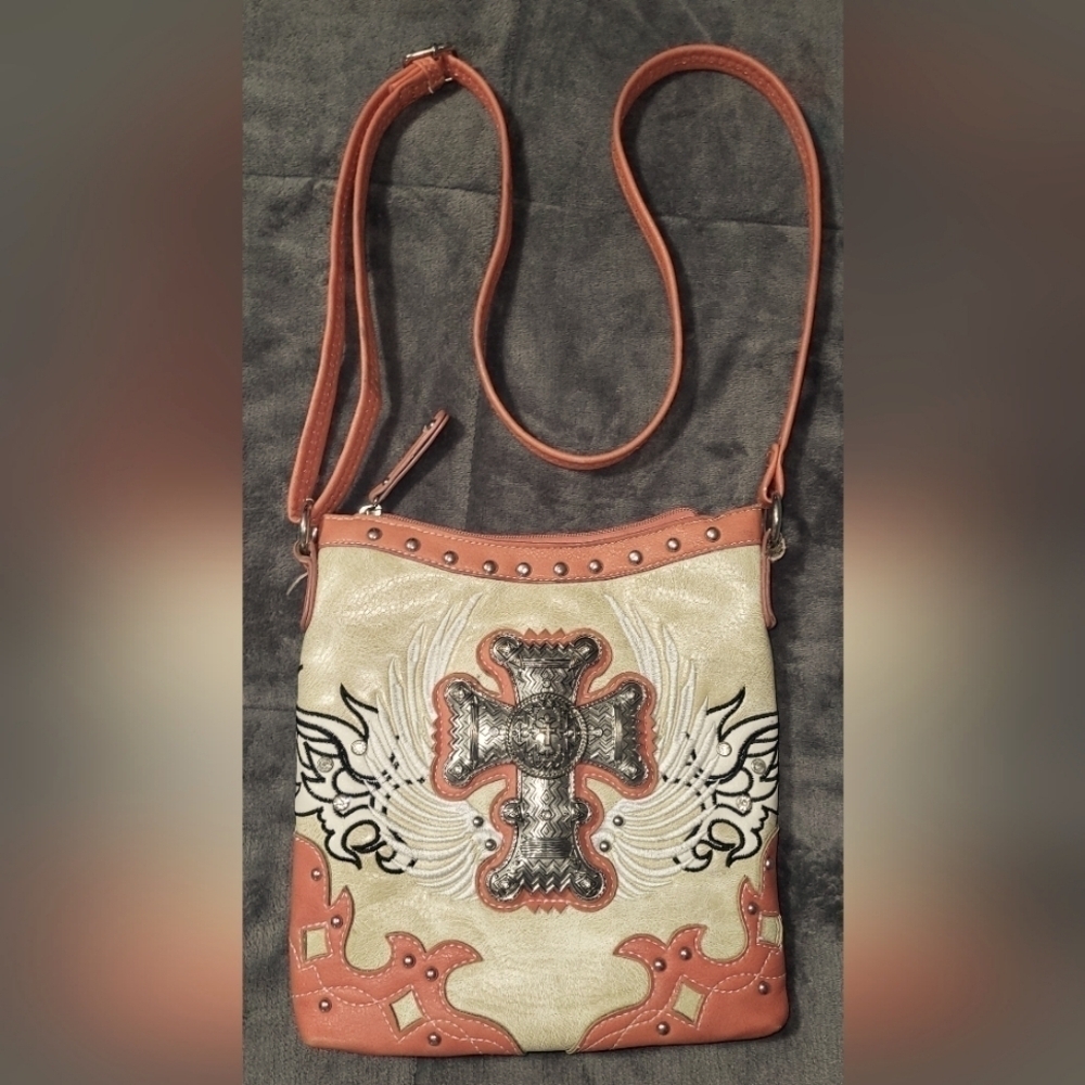 Stylish Crossbody Bag with Embroidered Cross and Wing Design